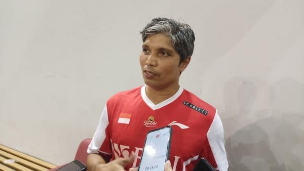 Coach Irwansyah pasrah jikalau nanti anak asuhnya Jonatan Christie dan Chico Aura Dwi Wardoyo saling sikut di 16 besar All England 2023. (Foto: MPI/Bagas Abdiel)
