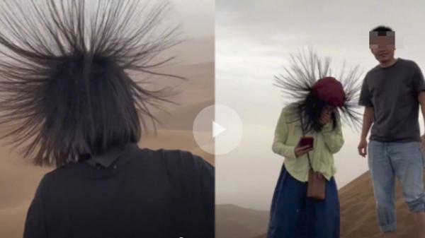 viral rambut turis berdiri di gurun Potongan video viral para turis dengan rambut tiba-tiba berdiri saat di gurun di China. Meski terlihat menyenangkan, fenomena ini disebut para ahli sebagai tanda bahaya. (Foto: screenshot video/global times)