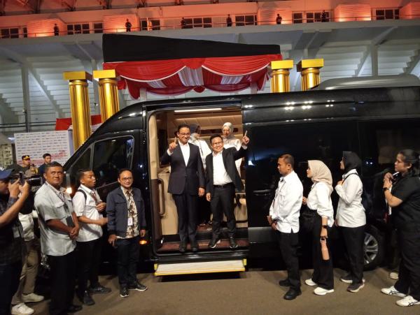 Anies Baswedan dan Muhaimin Iskandar mengenakan jas (Achmad Al Fiqri)