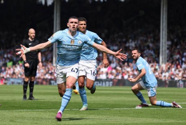 Gelandang Phil Foden  Manchester City Gelandang Phil Foden mencetak gol kedua Manchester City kontra Fulham pada pekan ke-37 Liga Inggris 2023-2024 di Craven Cottage, London, Sabtu (11/5/2024) malam WIB. (Foto: REUTERS)