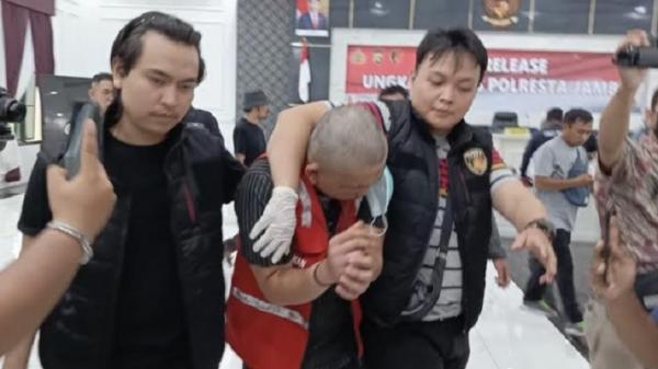 Pembunuh sadis di Kota Jambi Pembunuh Resty Widya di Kota Jambi ditangkap polisi. (Foto: Azhari Sultan Jambi).