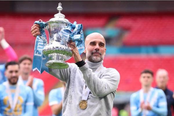 Pep Guardiola kembali membawa Manchester City juara Piala FA 2025-2026. (Foto: Manchester Evening News)
