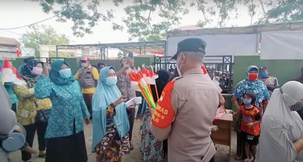 Ajak Antre Vaksinasi Sambil Nyanyi Indonesia Raya, Polisi: Biar Tidak Jenuh