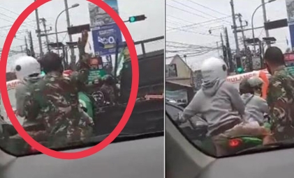 Viral! Orang Berpakaian Loreng, Tempeleng Pengendara Motor di Lampu Merah