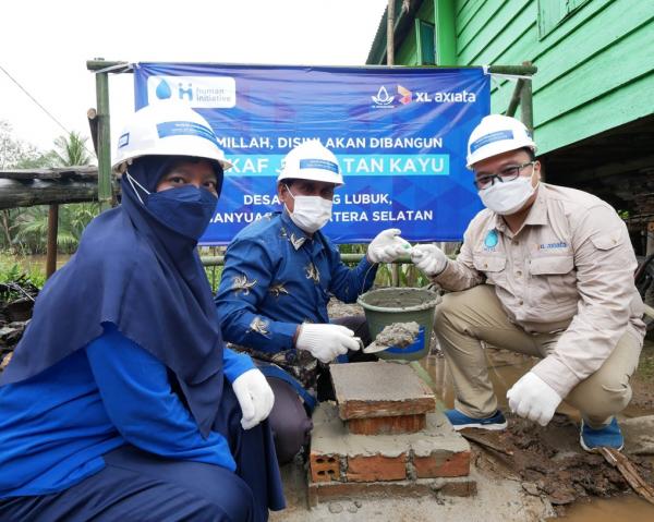 Wakaf, Karyawan XL Axiata Bangun Sarana Air Bersih dan Jembatan Desa di Banyuasin