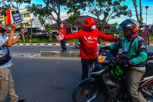 BIN Turun Ke Jalan Ajak Warga Vaksin COVID-19