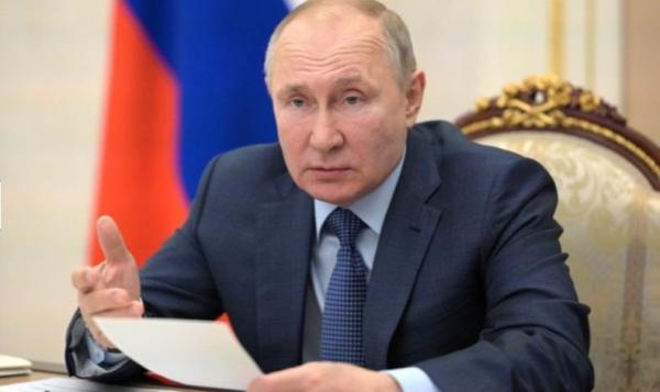 Jadikan Foto Putin Screensaver di Komputer Seorang Polwan Ditangkap