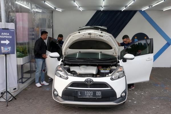 Beli Mobil Bekas di IIMS Surabaya 2022, Ini Tips dari Moladin