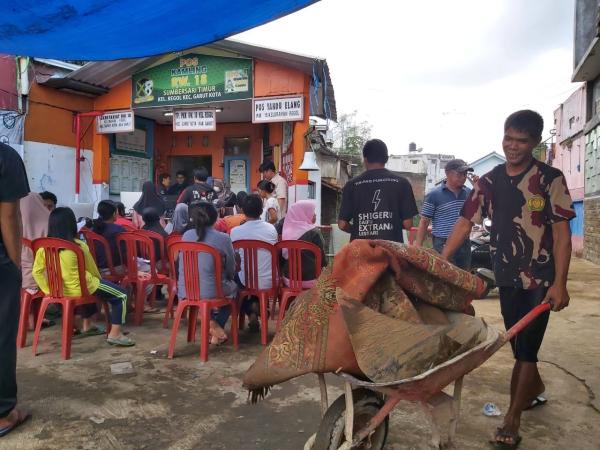 Jemput Bola Pelayanan Disdukcapil Garut Menyasar Lokasi Bencana Banjir