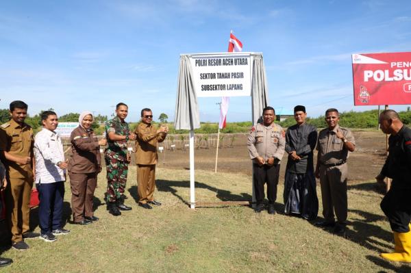 Pj Bupati Aceh Utara Apresiasi Pengukuhan Polsubsektor Lapang dan Penanaman 7.700 Mangrove