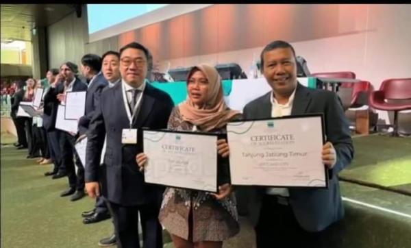 Bupati Tanjung Jabung Timur Romi Haryanto Terima Anugerah Ramsar's Award di Swiss
