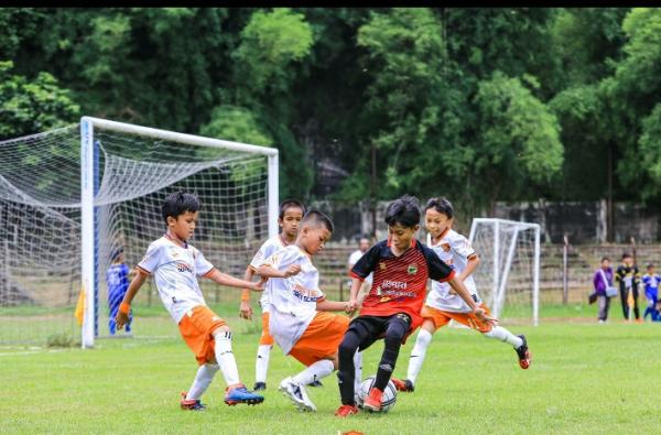 Laga Perdana di Ajang Sepakbola, Talenta Muda Flying Tiger Tampil Memukau pada SEAFT Indonesia 2023