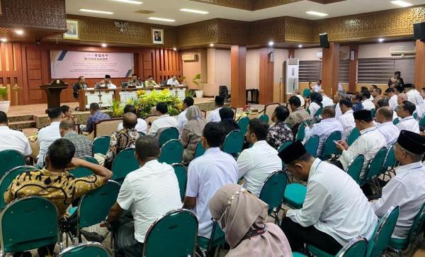 Haji Uma Jadi Pemateri Workshop Evaluasi Tata Kelola Keuangan dan Pembangunan Desa di Aceh
