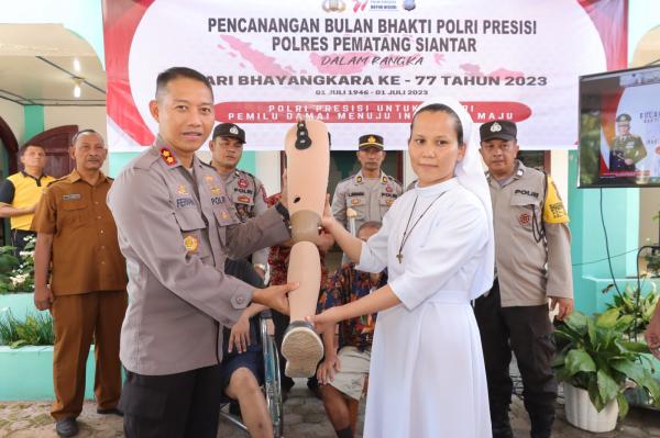 Sambut HUT Bhayangkara ke-77 , Polres Pematang Siantar Bedah Rumah dan Berbagi Kasih