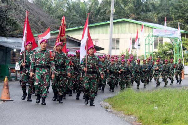 Satgasmar Pam Ambalat XXIX Kirab Merah Putih di Perbatasan Indonesia-Malaysia