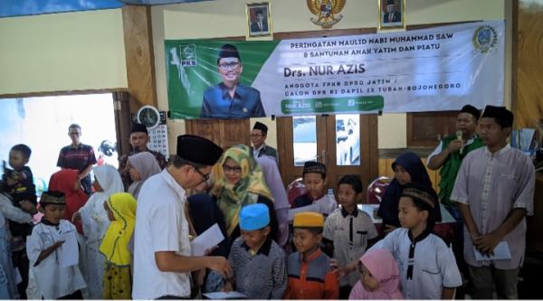 Maulid Muhammad SAW, Nur Azis Santuni Puluhan Anak Yatim dan Serahkan Seragam Lazisnu