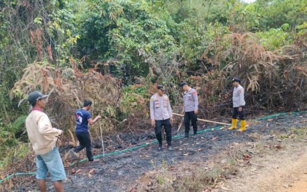 Polisi Melakukan Penyelidikan Lahan Bekas Terbakar di Kecamatan Air Naningan