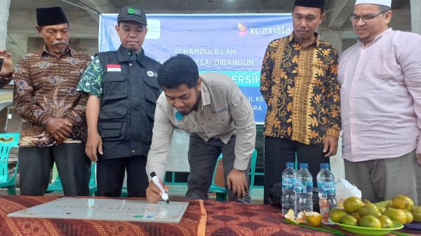Bantu Masyarakat di Sumut, Karyawan XL Axiata Bangun Sarana Air Bersih di Dairi dan Simalungun
