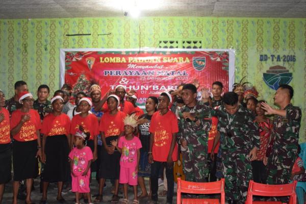 Sambut Hari Raya Natal, Satgas Yonif 122/TS Adakan Lomba Paduan Suara di Kampung Pikere