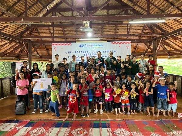 WOM Finance Berbagi Kasih Natal Bersama Anak Panti Asuhan di Medan