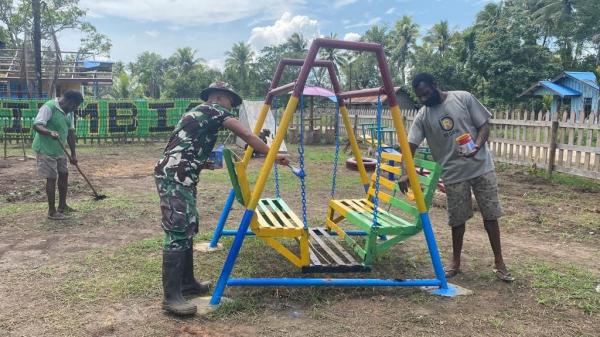 Dukung Pendidikan Usia Dini, Satgas Yonif 125 Bangun Taman Bermain di Kampung Poo Merauke