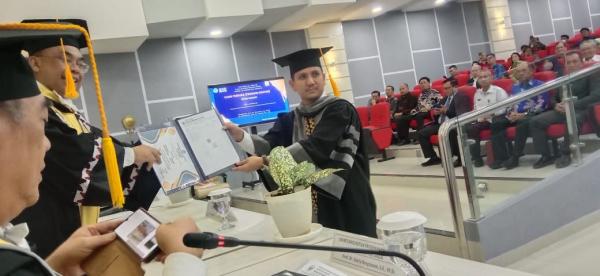 Rudhi Iswandi, Pejabat di Pemkab Lampung Selatan Raih Gelar Doktor ke-37 Ilmu Ekonomi Unila