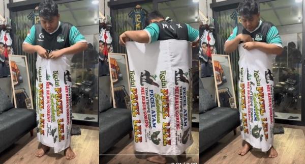 Aksi Pria Ini Bikin Heboh Pakai Sarung Motif Tenda Pecel Lele Viral di Medsos,Netizen:Outfi Lebaran