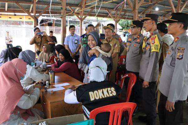 Polres Touna Gelar Bantuan Sosial dan Bakti Kesehatan Sambut Bhayangkara Ke-78