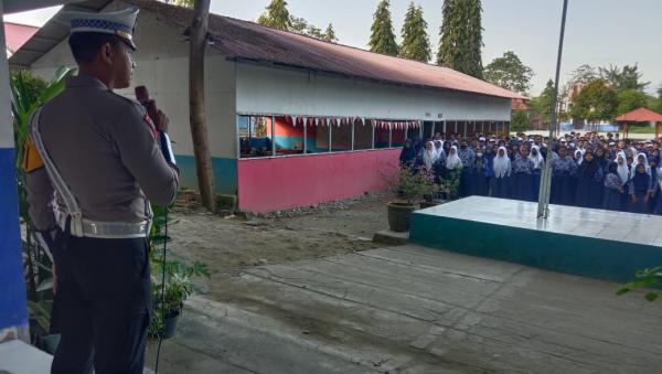 Polres Sigi “Go To School” Sosialisasi Kamseltibcarlantas di SMP Negeri 1 Sigi