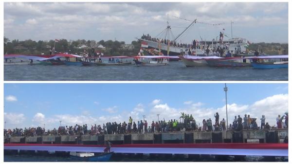 Spektakuler Sang  Merah Putih Raksasa Dibentangkan dan Dikibarkan, Hubungkan 2 Pelabuhan di Waingapu