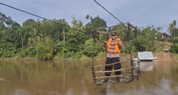 Kapolsek Rambah Hilir Sampaikan Pesan Damai Pilkada di Muara Nikum