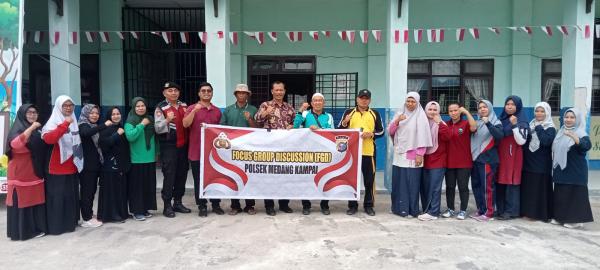 Polsek Medang Kampai Laksanakan Kegiatan Forum Group Discussion Bertempat di SDN 002 Pelintung