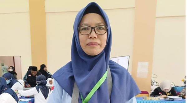 Kisah Marhani, Perempuan Pertama Pimpin Kloter Haji Embarkasi Medan