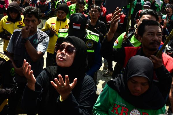 Potret Aksi Damai Driver Ojek Online di Palembang