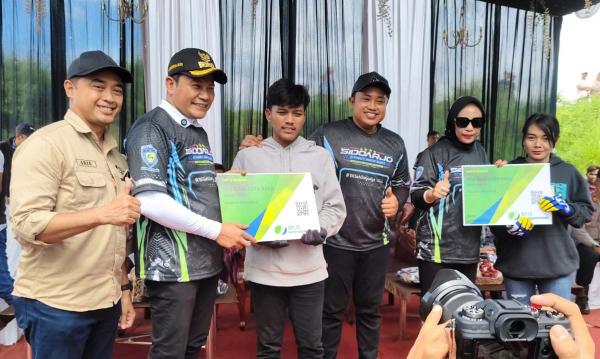BPJS Ketenagakerjaan Lindungi 300 Pembalap Dragbike Street Race Sidoarjo 2025