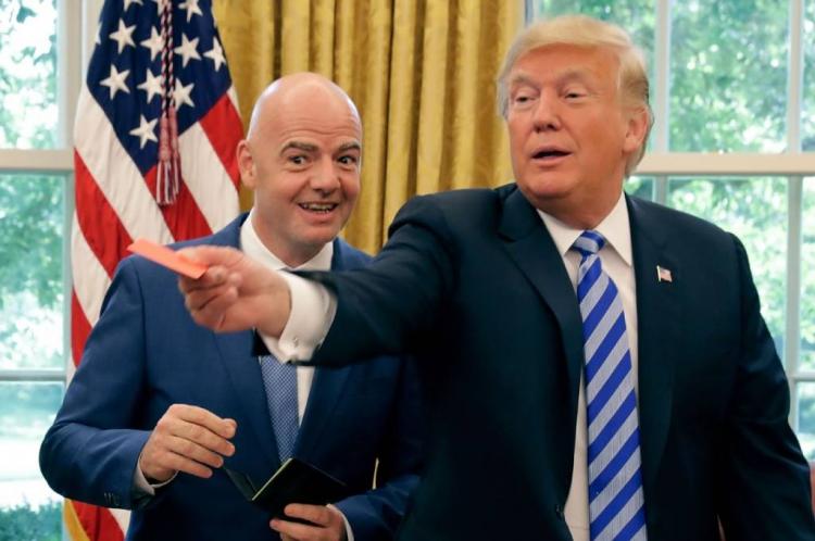 https://img.inews.co.id/media/750/files/inews_new/2025/08/13/donald_trump_gianni_infantino.jpg