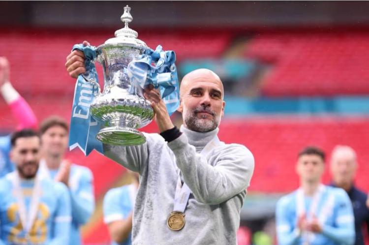 https://img.inews.co.id/media/750/files/inews_new/2026/05/17/pep_guardiola_juara.jpg