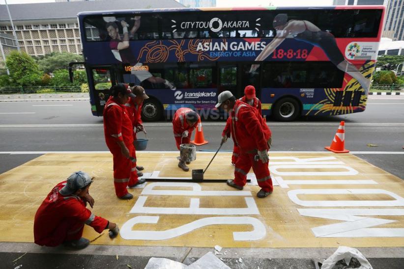 Jalur Khusus Sepeda Motor Jalan MH Thamrin-Merdeka Barat Dicat Kuning - Bagian 1