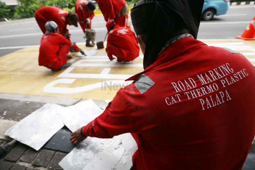 Jalur Khusus Sepeda Motor Jalan MH Thamrin-Merdeka Barat Dicat Kuning - Bagian 5