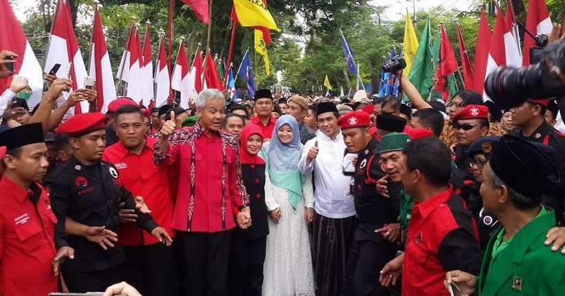 title Naik Andong, Ganjar-Yasin Resmi Mendaftar ke KPU Jateng Naik Andong, Ganjar-Yasin Resmi Mendaftar ke KPU Jateng