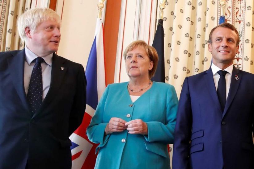 Soal Pengayaan Uranium, Angela Merkel, Macron, PM Johnson Kompak Desak Iran Tahan Diri