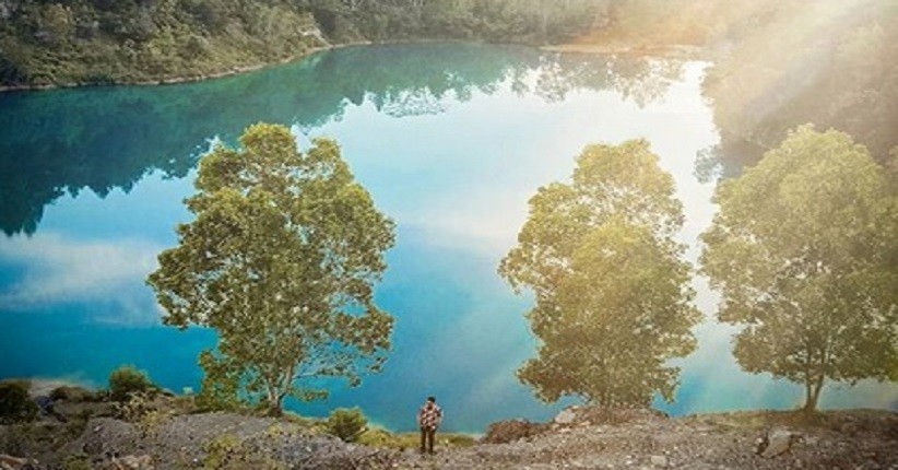 Terpikat Keindahan Danau Biru Sawahlunto, Terlihat Eksotis Dikelilingi Gunung Batu