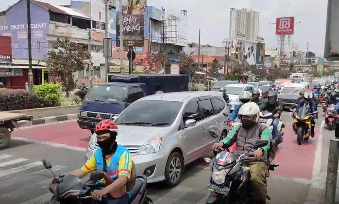 Cegah Corona, Lampu Merah di Depok Dipasang Audio Imbauan Jaga Jarak