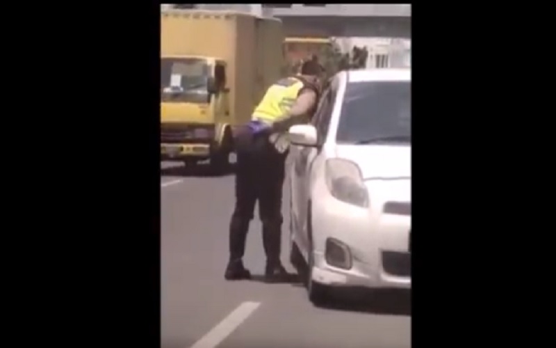 Viral Oknum Polantas Medan Ludahi Pengemudi Mobil, Diduga Minta Uang
