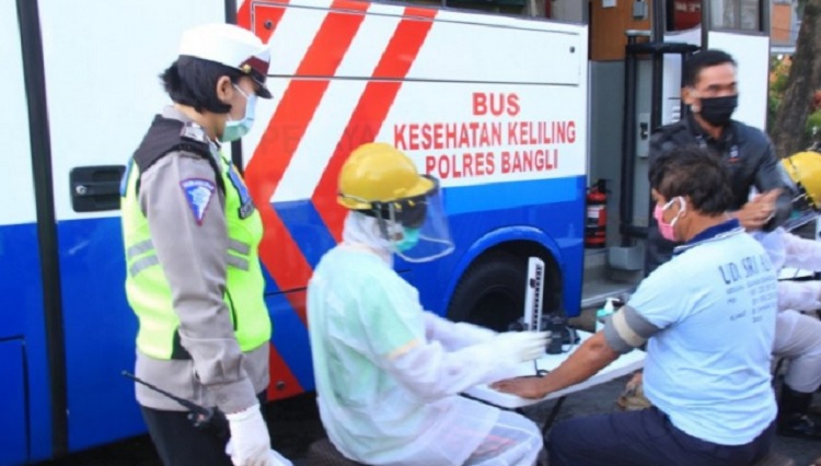 Mobil SIM Keliling Polres Bangli Disulap Jadi Pos Pemeriksaan Covid-19