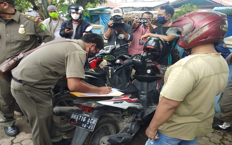 246 Warga Medan Terjaring Razia Masker, Dihukum Push-Up hingga Penyitaan E-KTP