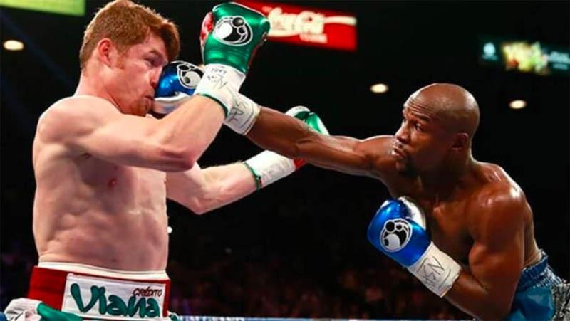 Floyd Mayweather Jr vs Saul Canelo Alvarez (Foto: Youtube)