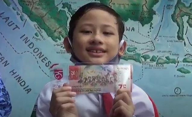 Cerita Nizam Siswa SD Tarakan yang Jadi Model Baju Adat Suku Tidung di Uang Rp75.000 