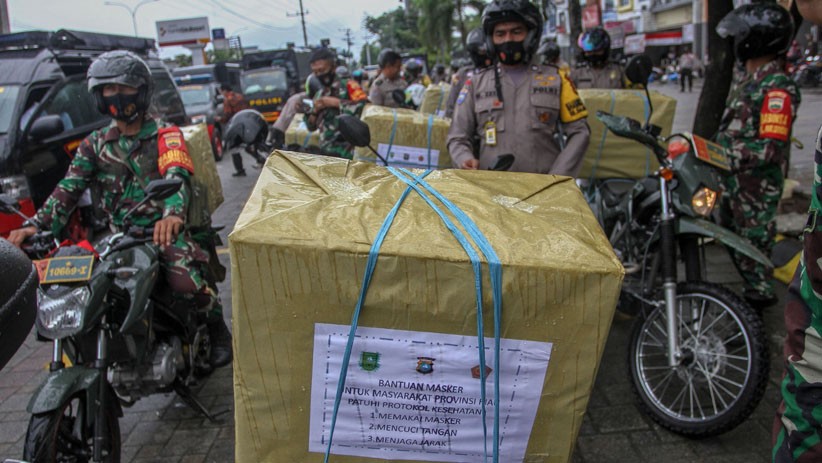 Tekan Penyebaran Corona, 630.000 Masker Dibagikan ke Seluruh Wilayah di Riau - Bagian 2
