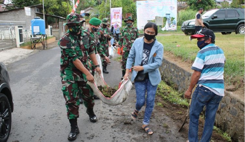 Kodam Merdeka dan Mahasiswa KKT Unsrat Gelar Kerja Bakti di Tingkulu Manado